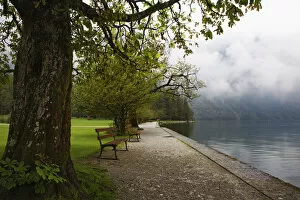 Europe, Germany, Lake Konigssee. Benches overlooking lake