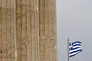Images Dated 26th May 2005: Europe, Greece, Athens, Acropolis. Three pillars of the Parthenon and the Greek flag