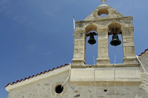 Europe, Greece, Crete (aka Kriti). Small village of Kato Aites, church bell tower