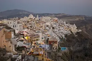Europe, Greece, Dodecanese, Santorini: View of Fira as the sun sets