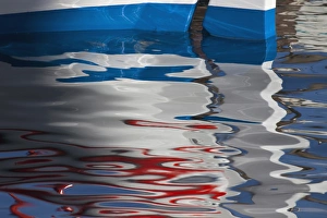 Images Dated 17th May 2010: Europe, Greece, Greek Island, Crete, Harbor of Chania and boat in calm water reflection