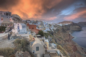 Dramatic Sky Prints: Europe, Greece, Greek Island, Santorini, Oia, Sunset with colorful lite clouds over