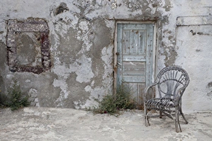 Images Dated 21st May 2010: Europe, Greece, Greek Island, Santorini, Old Building chair and doorway in town of Oia