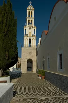 Europe, Greece, Halki, Emborios: pebbled hohlaki courtyard in Emborios church