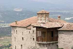 Europe, Greece, Meteora. Overview of Saint Barbara Roussanou Monastery and wood balcony