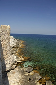 Europe, Greece, Peloponnese, Monemvasia. Medieval city walls go right up to the clear