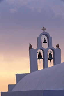 Images Dated 14th June 2005: Europe, Greece, Santorini. Belltower at sunrise