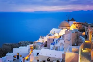 Lighting Prints: Europe, Greece, Santorini, Oia. Sunset on coastal town
