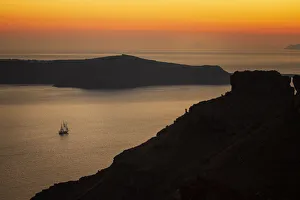 Europe, Greece, Santorini. Sunset on sailboat