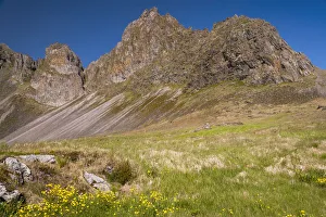 Mountains Prints: Europe, Iceland, North Iceland. Mountain peaks rise high above the coast
