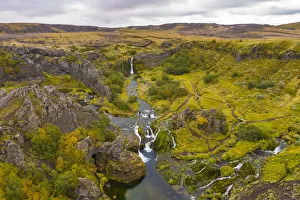 Icelandic Prints: Europe, Iceland. Panoramic aerial view of Gjain waterfalls in a tranquil