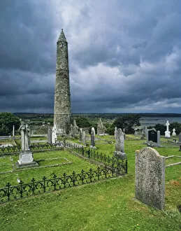 Images Dated 11th June 2007: Europe, Ireland, County Waterford. The medieval Ardmore Church, cemetery, and Round Tower