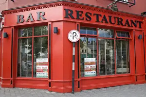 Riverwalk Prints: Europe, Ireland, Sligo. Outside of red bar and restaurant. Credit as: Wendy Kaveney