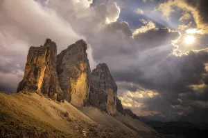 Europe, Italy, Dolomites. Tre Cime di Lavaredo peaks at sunset