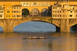 Ponte Vecchio Prints: Europe, Italy, Florence. Golden light of late afternoon illuminates the Ponte Vecchio
