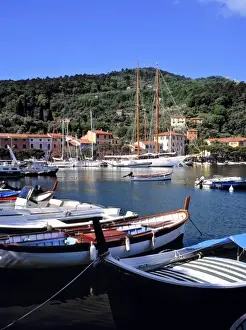 Liguria Prints: Europe, Italy, Le Grazie. Brightly colored boats dock in the harbor at Le Grazie