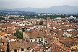 Europe, Italy, Lucca. Elevated view of the town with foggy hills in background. Credit as