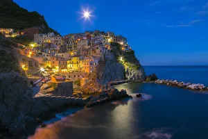 Images Dated 23rd May 2013: Europe, Italy, Manarola. Sunset on town