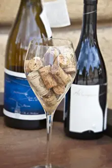 Full Prints: Europe; Italy; Monteriggoni; Chianti Wine and a Glass Full of Corks