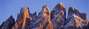 Europe, Italy, Odle Group. Late light accentuates the jagged surfaces of the Odle Group