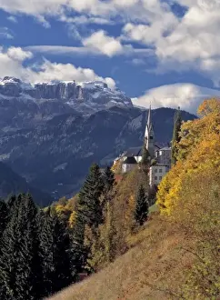 Hill Side Prints: Europe, Italy, Pieve area. The sharp spires of a church near Pieve, in the Dolomite Alps