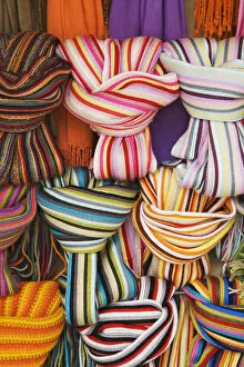 Europe, Italy, Pisa. Colorful scarfs for sale at a market