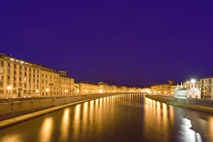 Images Dated 31st May 2006: Europe, Italy, Pisa. Lights reflect on the Arno River that runs through the town of Pisa
