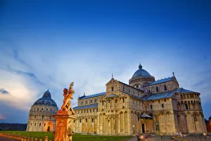 Europe, Italy, Pisa. Pisa Cathedral and statue at sunset
