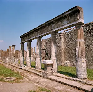 Roman Prints: Europe, Italy, Pompeii. A bronze reproduction of Greek god Apollo stands at the Temple