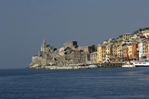 Europe, Italy, Portovenere aka Porto Venere. Colorful fishing village, fortress walls