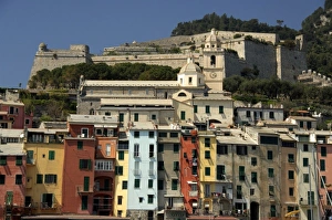 Europe, Italy, Portovenere aka Porto Venere. Colorful fishing village, fortress walls