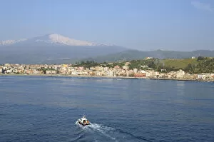 Europe, Italy, Sicily, port of Giardini Naxos, gateway to Taormina. Mt. Etna volcano