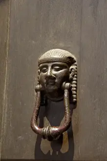 Europe, Italy, Sicily, Taormina. Door knocker with face