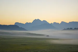 Dolomite Prints: Europe, Italy, South Tirol. Sunrise on the Sasso Lungo and Sasso Piatto Mountains
