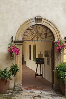 Images Dated 17th May 2010: Europe; Italy; Tuscany; Pienza; Doorway withFlowers Around them