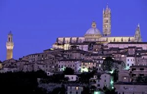 Europe, Italy, Tuscany, Siena. 13th C. Duomo and Palazzo Pubblico, evening