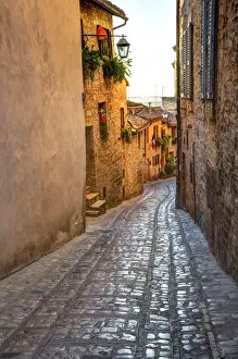 Umbria Prints: Europe; Italy; Umbria; Spello; Colored Buildins along a Back Street of Spello