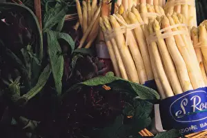 Europe, Italy, Venice. Artichokes and white asparagus for sale in Rialto Farmers Market