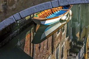 Images Dated 18th May 2009: Europe, Italy, Venice. Boat underneath bridge