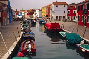 Neighborhood Prints: Europe, Italy, Venice, Burano. Colorful homes along canal on the island of Burano