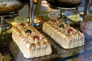 Europe, Italy, Venice. Cakes in a bakery window display