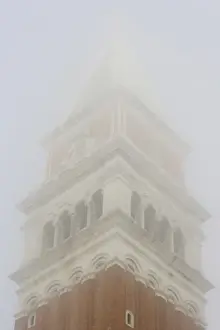 Images Dated 12th February 2009: Europe, Italy, Venice. The top of Campanile in early morning fog