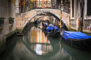 Prints of Europe, Italy, Venice. Canal with gondolas and bridges. Credit as: Jim Nilsen / Jaynes Gallery / DanitaDelimont.com Images Dated 2018 December: Europe, Italy, Venice. Canal with gondolas and bridges