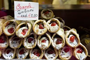 Language Prints: Europe, Italy, Venice. Cannoli for sale seen through a bakery window