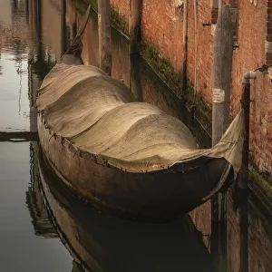 Jim Nilsen Prints: Europe, Italy, Venice. Covered old gondola on canal
