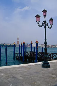 Europe, Italy, Venice. Lampost near gondola mooring spot on Grand Canal