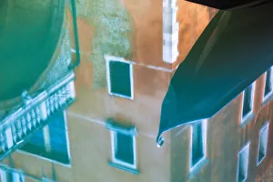 Still Prints: Europe, Italy, Venice. reflections of gondola and buildings in still canal