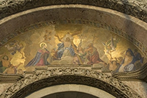 Images Dated 18th March 2005: Europe, Italy, Venice, St. Marks Basilica. Detail of door with gilded arch. Credit as