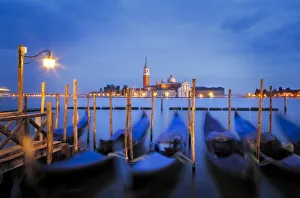 Lighting Prints: Europe, Italy, Venice. Sunset on gondolas and San Giorgio Maggiore church. Credit as
