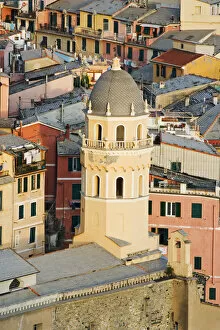 Images Dated 28th May 2006: Europe, Italy, Vernazza. Elevated view of the bell tower of a cathedral and surrounding buildings
